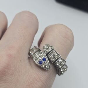 silver-toned, stretchable, snake-motif ring with clear and blue imitation gems